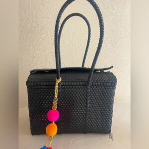 Bringing alittle Mexican Tote home. Used once.